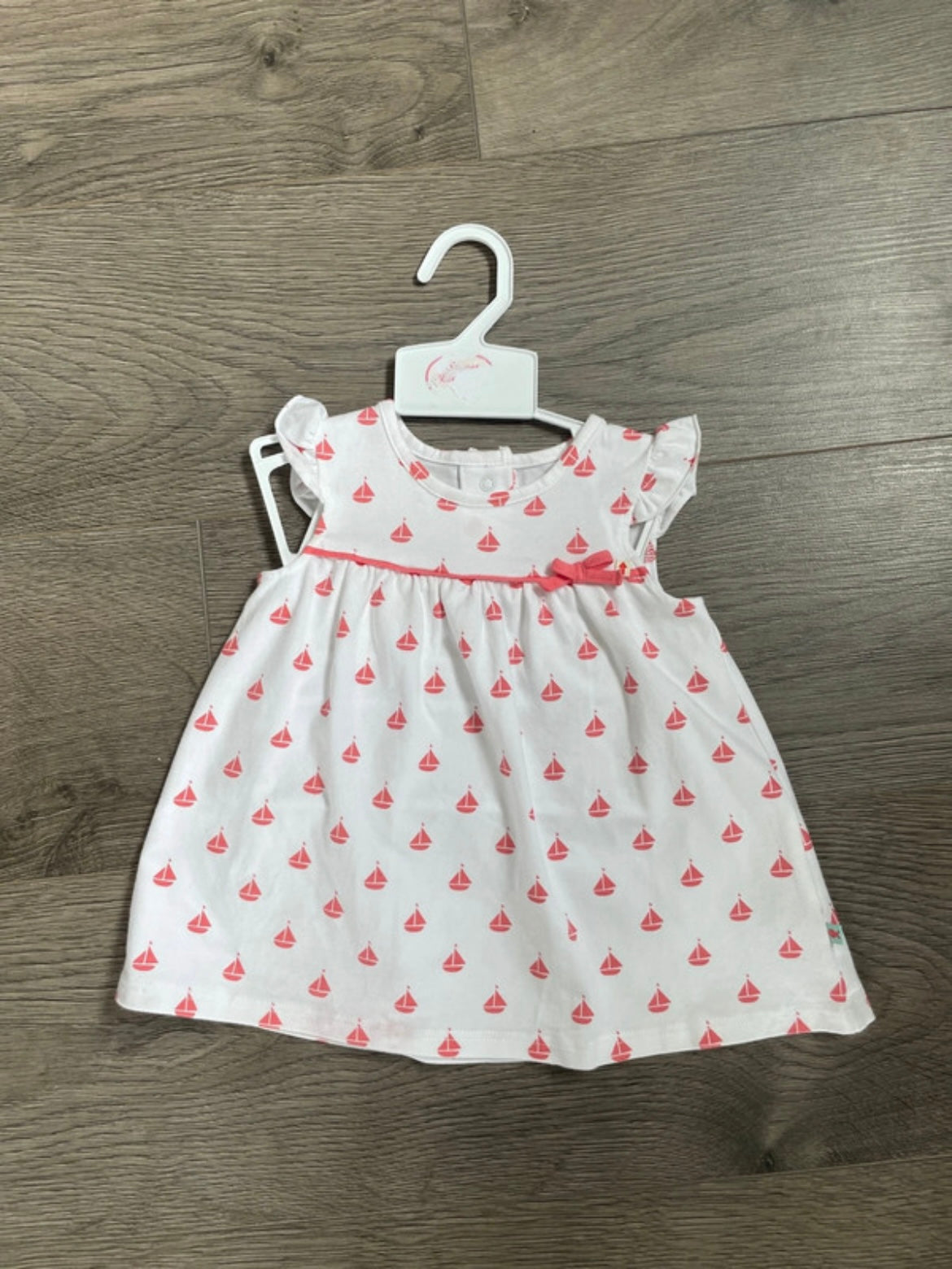 White dress with peach yachts (0-3 mths)